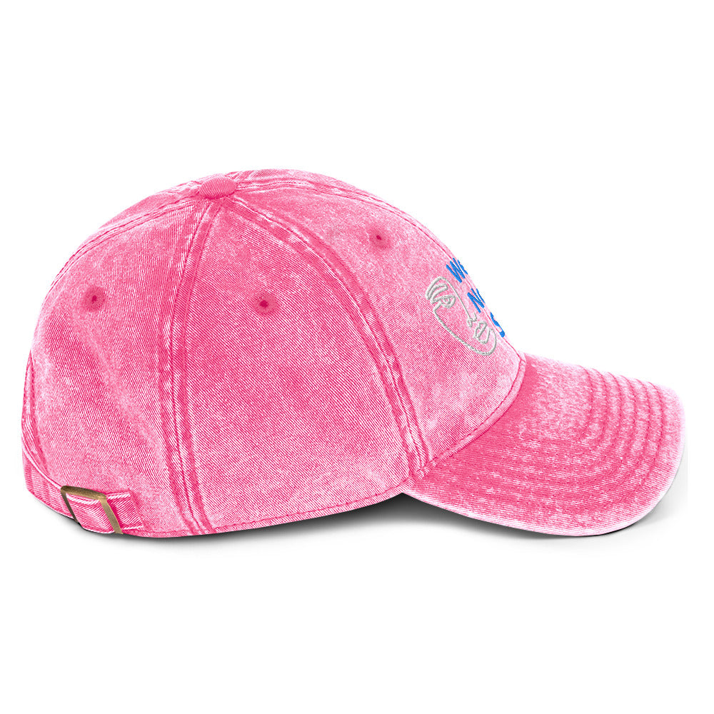 Side-view of the embroidered "We Are Not For Sale" cotton twill pink cap
